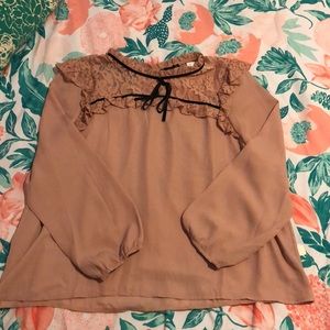 Mauve blouse with black bow and lace